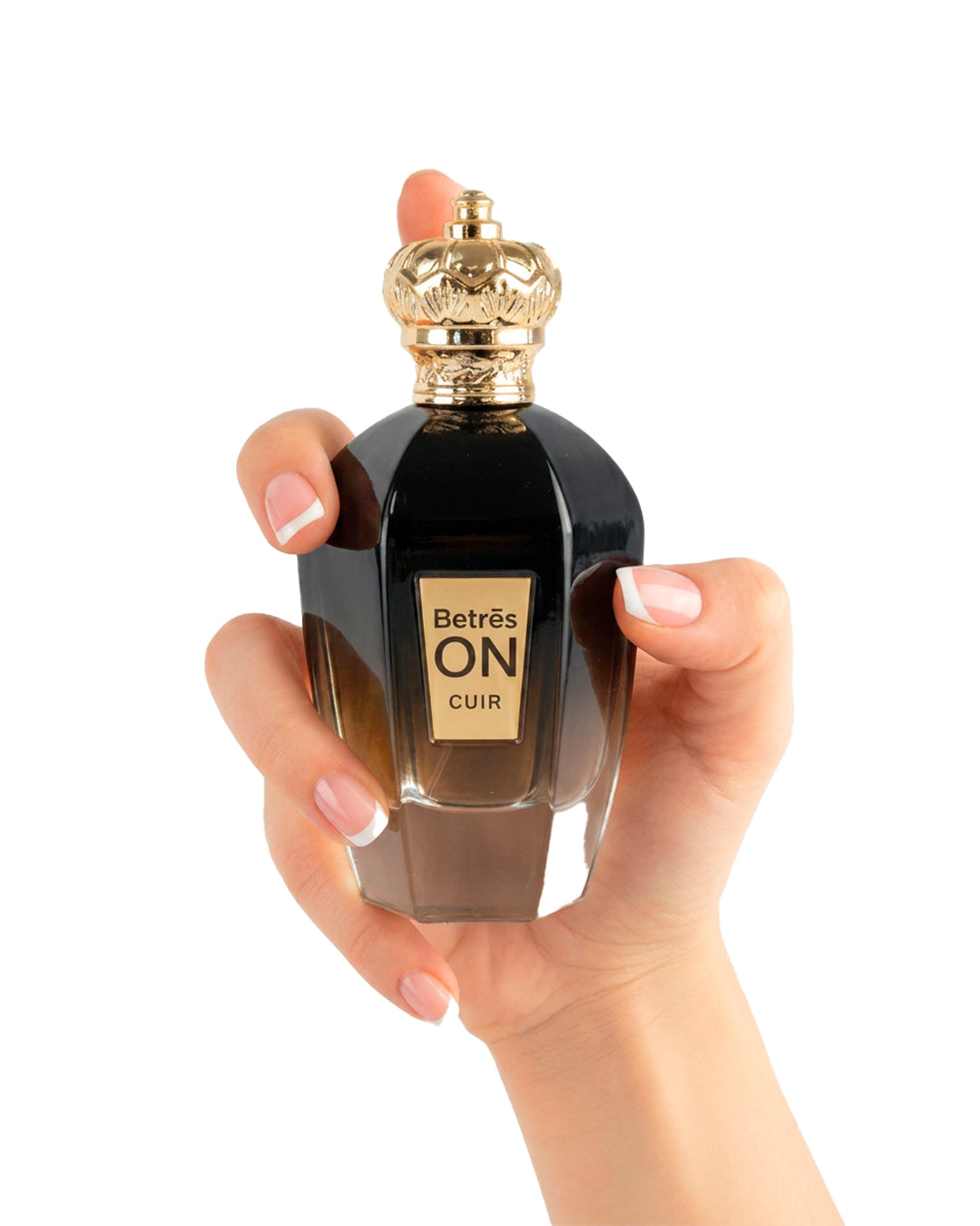 Betres On Cuir Eau de Parfum unisex bottle held in a hand